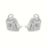 Édes, két színű, ölelő fülbevalók ezüstből és aranyból